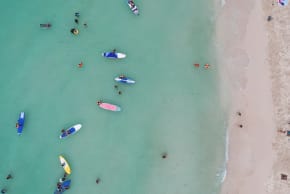 People relax along White Beach amid the coranavirus disease (COVID-19) outbreak, in Boracay Island, Aklan province, Philippines, December 1, 2021. Picture taken December 1, 2021. Picture taken with drone. 