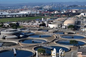 In an aerial view, pools of water are visible at the East Bay Municipal Utility District Wastewater Treatment Plant on March 20, 2024 in Oakland, California. 