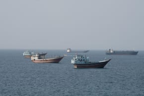 Vessels near the Strait of Hormuz, as seen from Musandam, Oman, August 17, 2026.