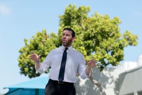 Florida Democratic congressional candidate Oliver Larkin speaks with supporters on August 15, 2026 in North Miami Beach, Florida. 