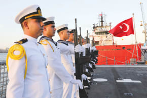 TURKISH NAVY FORCES aboard the TCG Gaziantep (F-490), a guided-missile frigate, ahead of launch of drilling vessel ‘Cagri Bey,’ set to conduct Turkey’s first deep-sea drilling operation in the Indian Ocean near the Mogadishu seaport, in Somalia, April 10.  