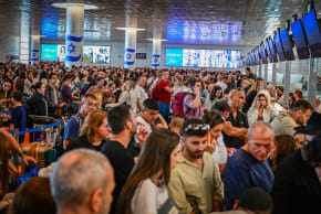 Thousands of passengers wait at Ben Gurion International Airport near Tel Aviv after a strike was announced, August 20, 2026. 