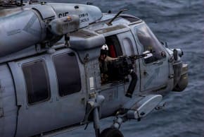An MH-60S Sea Hawk prepares to land on the flight deck of the U.S. Navy Nimitz-class aircraft carrier USS Abraham Lincoln which is supporting US military operations in the war with Iran, August 14, 2026. 