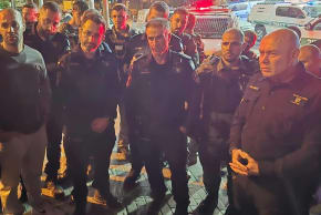 Police hold a situational assessment at the scene of a violent outbreak in east Jerusalem on August 22, 2026. 