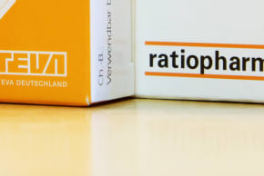 Boxes of medication by German pharmaceuticals company Ratiopharm and Israeli pharmaceutical company Teva stand next to each other at a pharmacy.