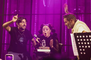 NUNU BLOWS OUT the candle on her five-year career cake, alongside Guri Alfi (right), at the Barby last weekend