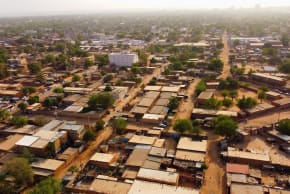 (Illustrative) A drone picture shows a suburb following the attack on the international airport in Niamey, Niger, on January 30, 2026.