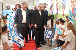 Prime Minister Benjamin Netanyahu and Education Minister Yoav Kisch with students from the Benzion Netanyahu School in Ramle.