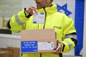 Flu vaccines at Clalit’s logistics center