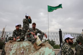 Members of Houthi security forces sit on a rock at the site of a rally held to commemorate Mawlid, marking the anniversary of Prophet Muhammad's birthday, in Sanaa, Yemen, August 25, 2026. 