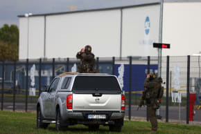 German special police forces secure the area on the day of German Chancellor and Christian Democratic Union (CDU) party leader Friedrich Merz, and Saxony-Anhalt State Prime Minister and top candidate Sven Schulze visit to UPM Biochemicals in Leuna, Germany, September 3, 2026. 