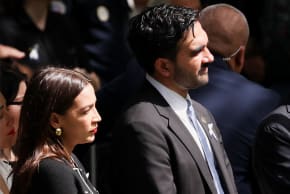 New York City Mayor Zohran Mamdani and U.S. Rep. Alexandria Ocasio-Cortez (D-N.Y) listen as the names of victims are read during a ceremony marking the 25th anniversary of the September 11, 2001 attacks on the World Trade Center at the 9/11 Memorial, in New York City, U.S., September 11, 2026.
