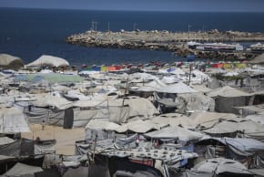 Tents housing displaced Palestinians are seen among homes destroyed during the recent war between Israel and Hamas in Gaza City, central Gaza Strip, September 3, 2026. 