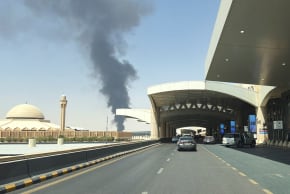 Smoke rises from the fuel storage depot at King Khalid International Airport in the aftermath of Houthi strikes, in Riyadh, Saudi Arabia, September 19, 2026. Picture taken with a mobile phone. 