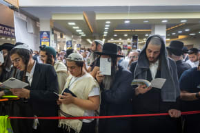 Jewish men at the tomb of Rabbi Nachman of Breslov in Uman, ahead of the Jewish holiday of Rosh Hashanah, September 22, 2025.