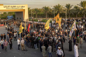 Demonstrators gather outside the Al-Najaf Al-Ashraf International Airport in Najaf on September 28, 2026, demanding the facility to be reopened for flights from Iran. 