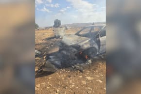Damage to a vehicle following an arson and attempted stabbing attack at Hanania's farm near Geva Binyamin in the West Bank on October 5, 2026.