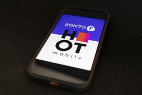 An illustration showing the logos of Pelephone and Hot Mobile displayed on a Pelephone screen in Jerusalem, November 17, 2025.
