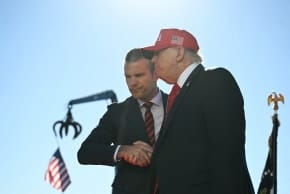 US President Donald Trump (R) shakes hands with Secretary of Defense Pete Hegseth as he arrives to speak at Anduril Industries in Sparrows Point, Maryland, on October 6, 2026; illustrative