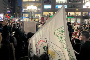 Pro-Palestinian protesters overwhelm the area of New York City's Union Square where an Israeli peace group planned to hold an Oct. 7 vigil on Oct. 7, 2026.