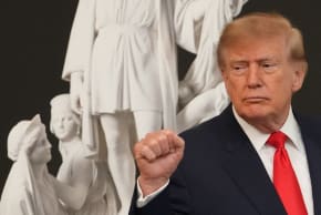 US President Donald Trump gestures at the end of a Columbus Day celebration in the East Room of the White House in Washington, DC, US, October 9, 2026. 