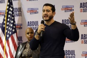 Democrat US Senate candidate for Michigan Abdul El-Sayed speaks on stage with US Representative Ayanna Pressley (L), Democrat of Massachusetts during a midterm campaign rally in Flint, Michigan on October 18, 2026. 