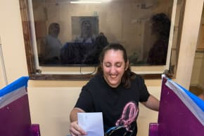 A resident of a rehabilitation village operated by Perach Israel practices voting ahead of the October 27, 2026 Knesset election.