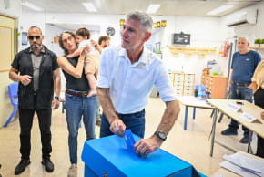 Democrats party chairman Yair Golan casts his vote at a polling station in Rosh Ha'ayin, central Israel, during Election Day, October 27, 2026
