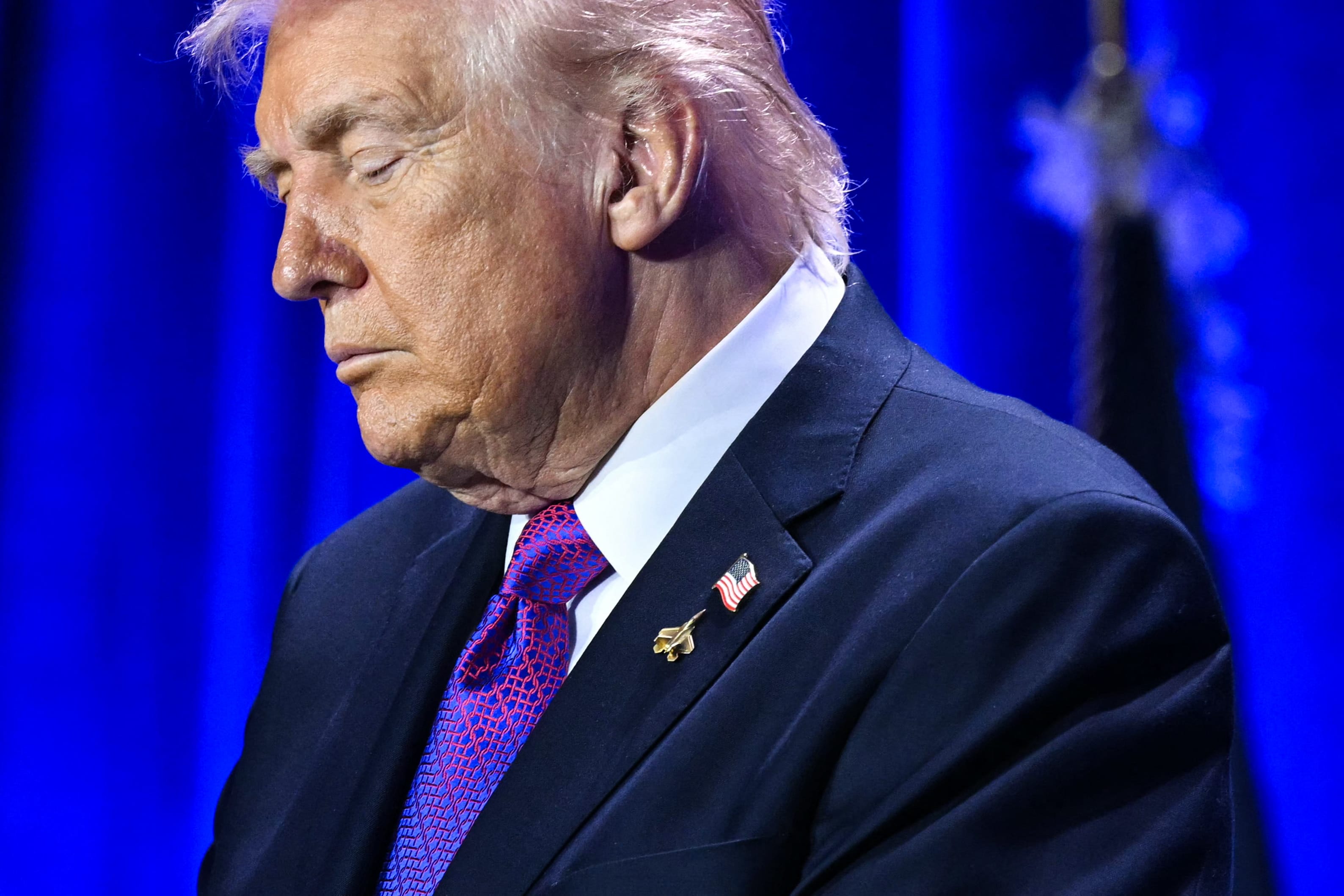 US President Donald Trump bows his head in prayer during the National Prayer Breakfast at the Washington Hilton in Washington, DC on February 5, 2026. (photo credit: SAUL LOEB / AFP via Getty Images)
