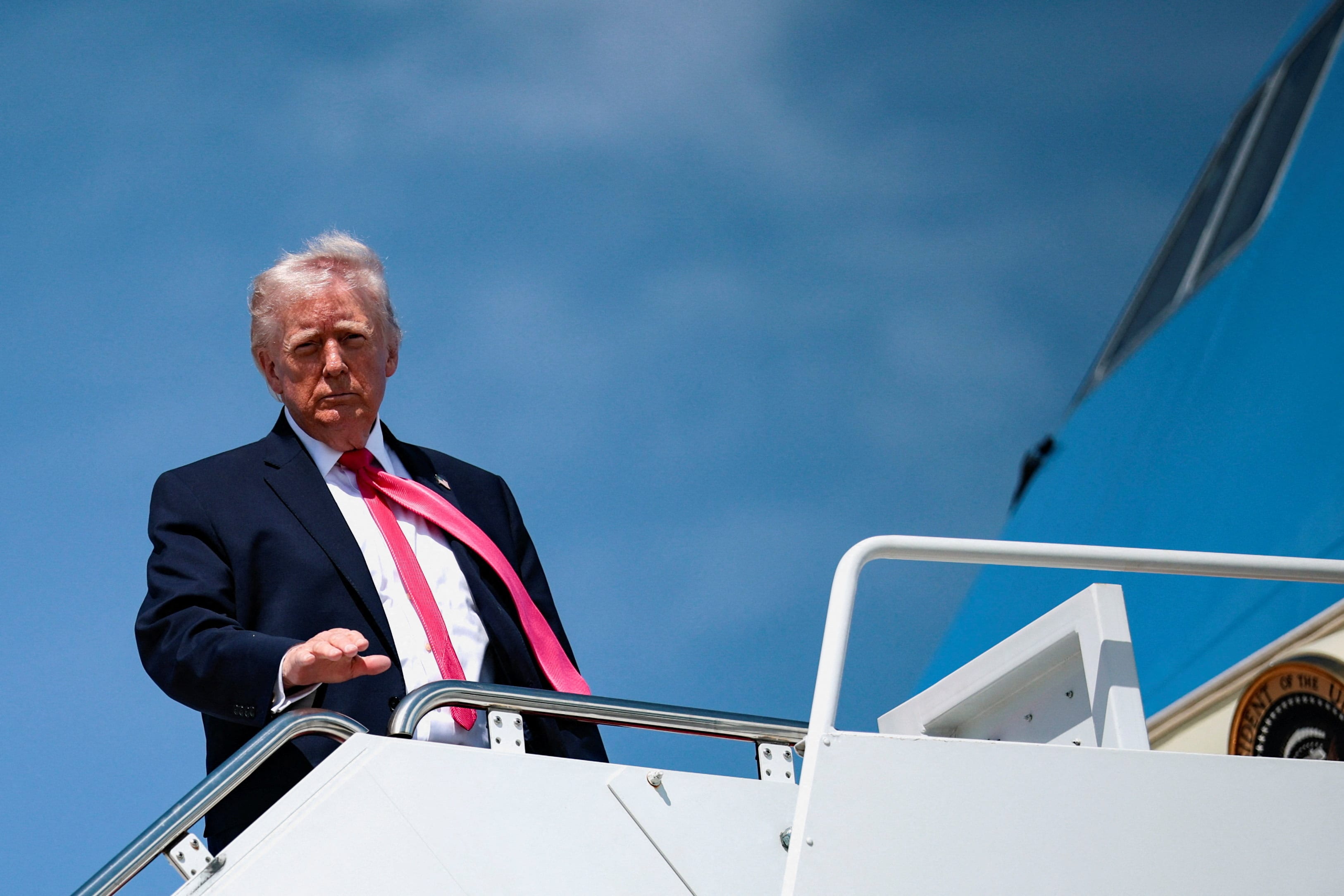 US President Donald Trump looks on as he boards Air Force One for his trip to Las Vegas, Nevada, as he departs Joint Base Andrews, Maryland, US, on the day he announced that Israeli and Lebanese leaders had agreed to begin a 10-day ceasefire, April 16, 2026.  (photo credit: REUTERS/Evan Vucci)