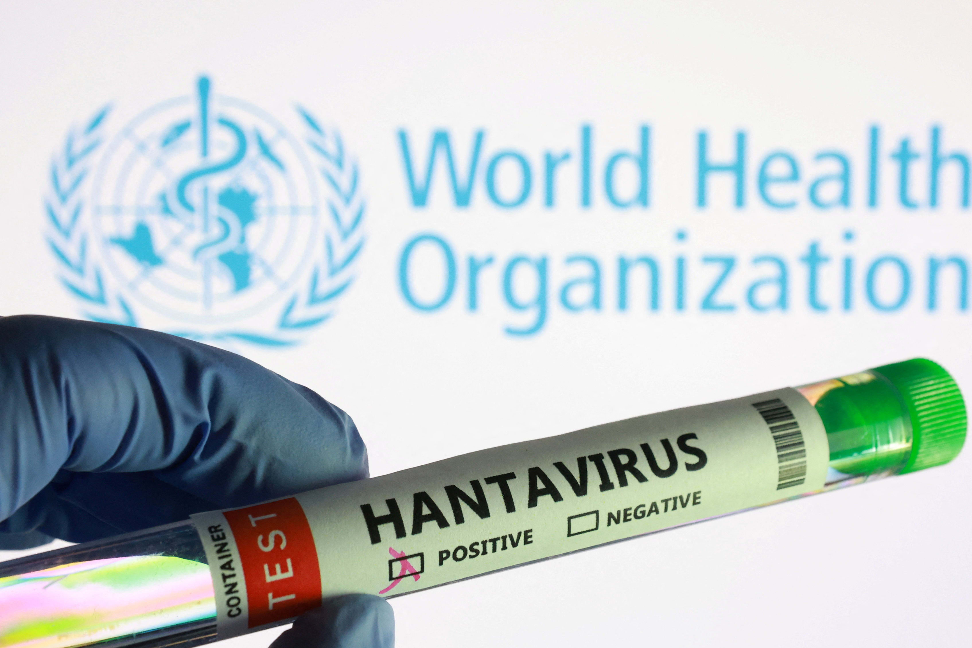 A test tube labelled "Hantavirus positive" label and World Health Organization logo are seen in this illustration taken May 7, 2026. (photo credit: REUTERS/DADO RUVIC/ILLUSTRATION)