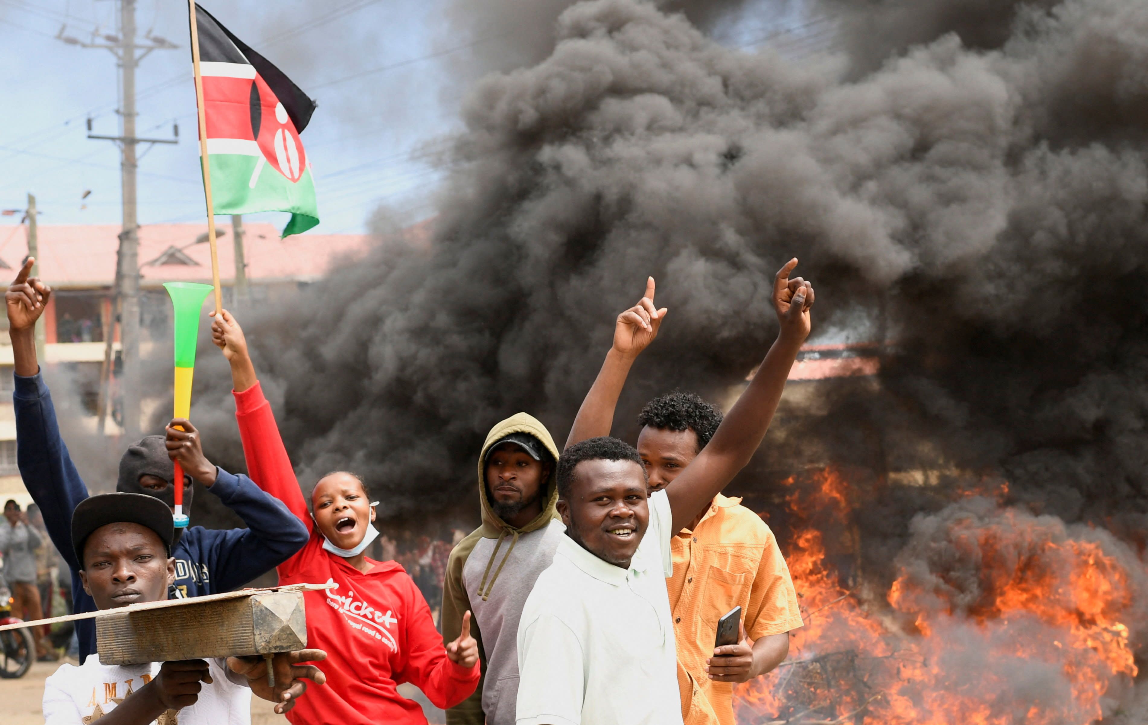 Demonstrators gather near a barricade they created during a protest against a U.S.-backed Ebola quarantine plan on the establishment of a 50-bed facility at a Kenyan air force base that was intended to host Americans exposed to Ebola, in Nanyuki town, in Laikipia County, Kenya June 1, 2026. (photo credit: REUTERS/John Muchucha)