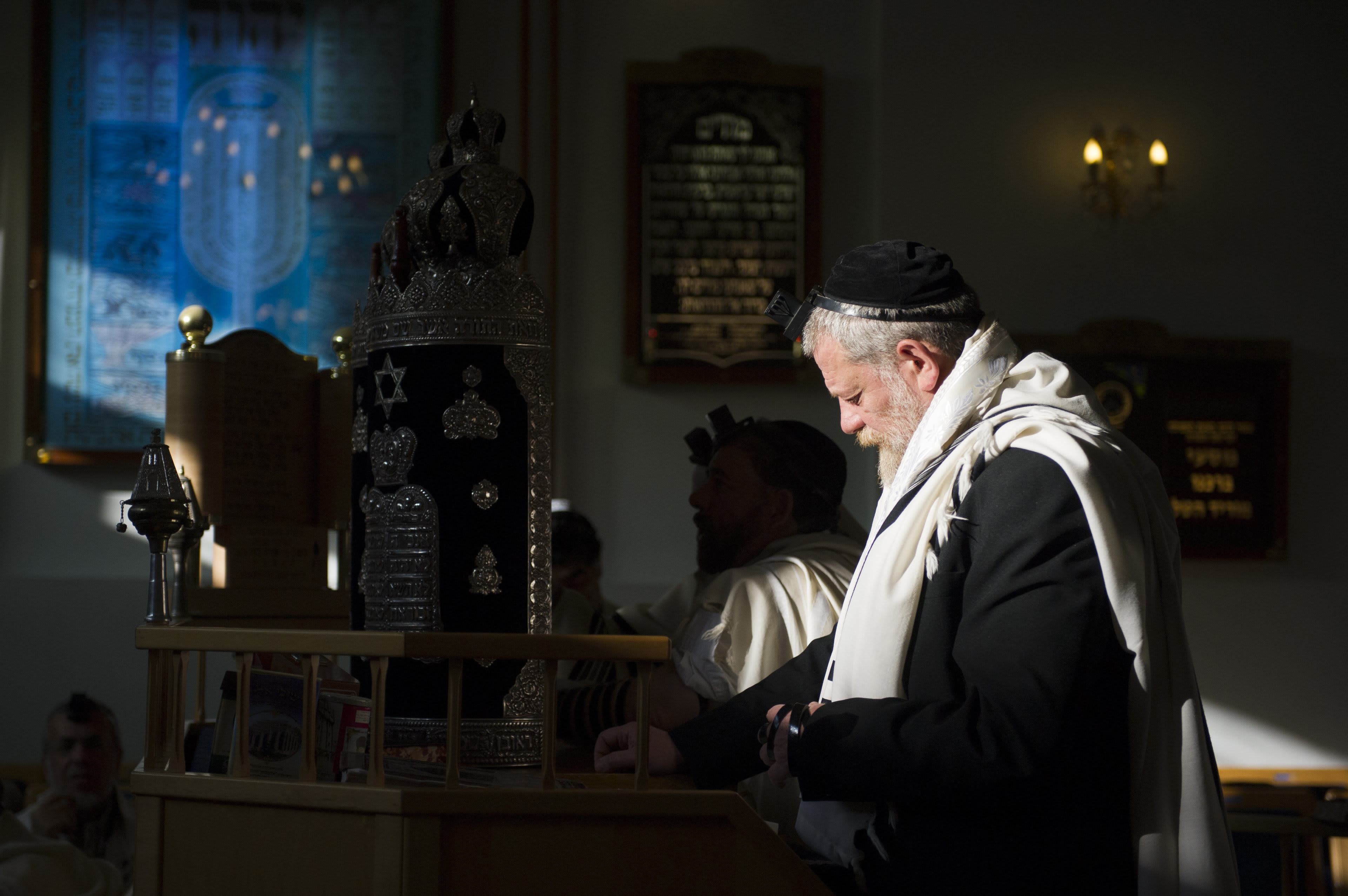 Jewish men pray in a Belgian synagogue. (photo credit: JOHANNA GERON/REUTERS)