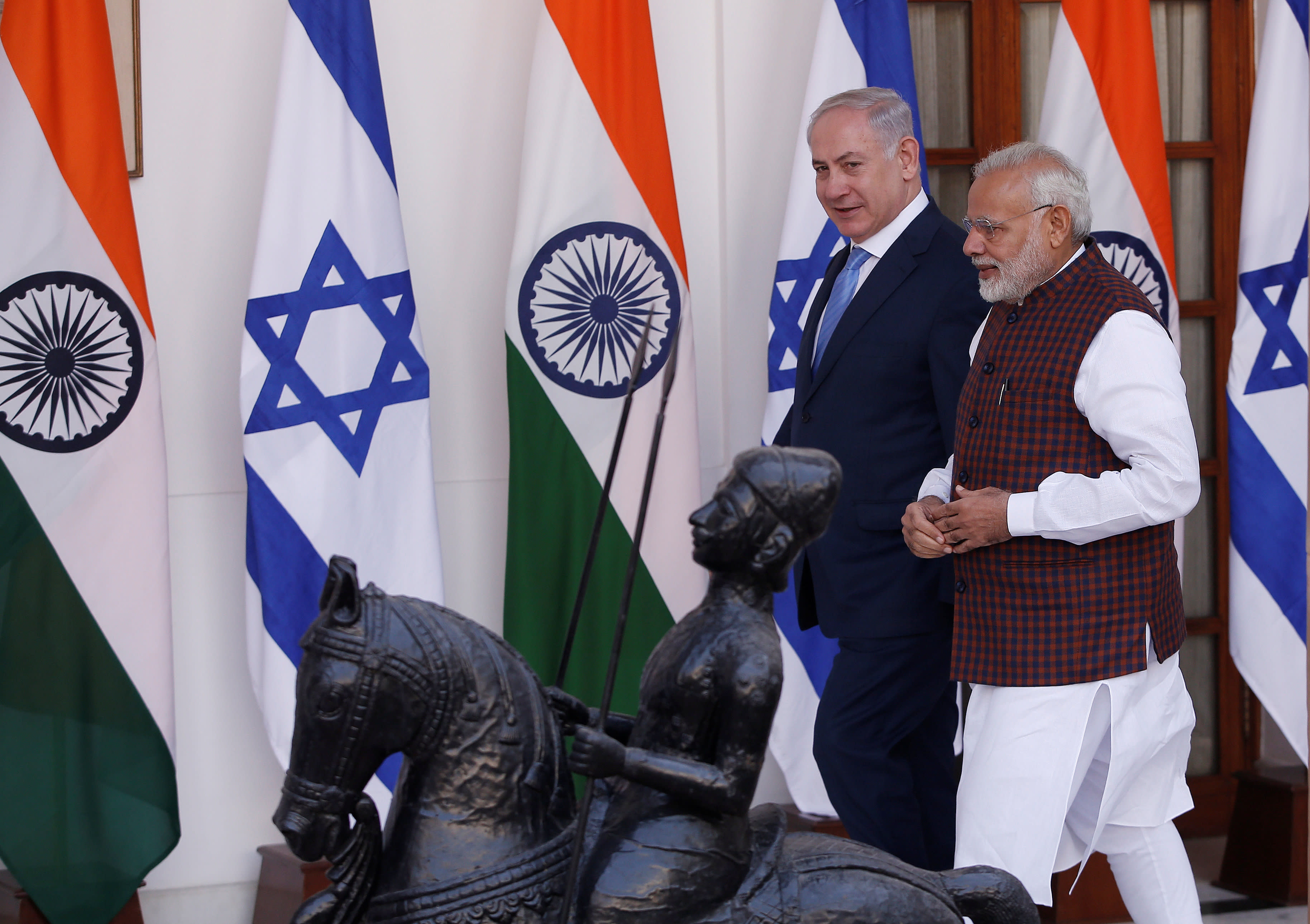 Israeli Prime Minister Benjamin Netanyahu and his Indian counterpart Narendra Modi arrive for a photo opportunity ahead of their meeting at Hyderabad House in New Delhi, India, January 15, 2018. (photo credit: Adnan Abidi/Reuters)