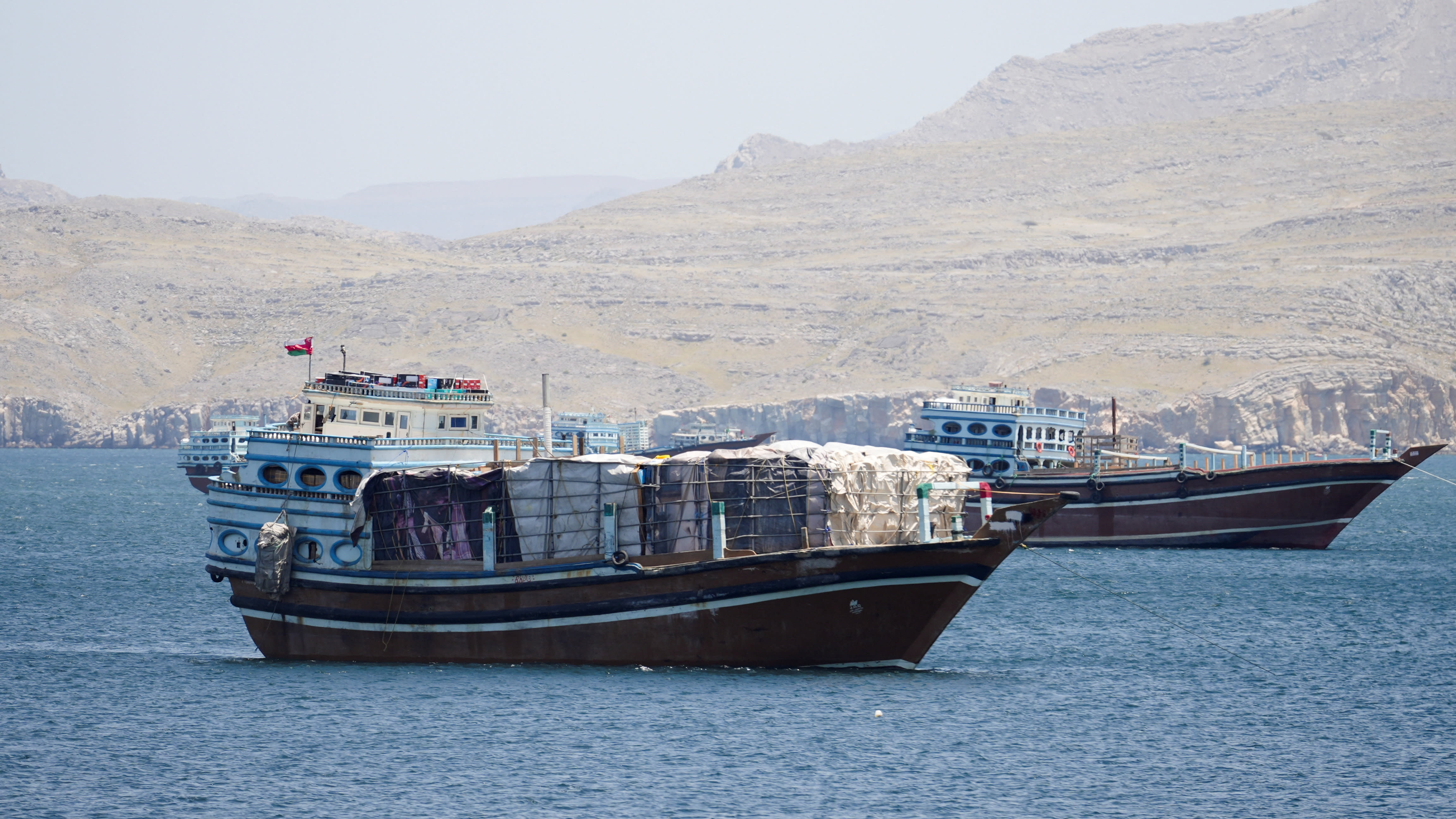 Vessels in the Strait of Hormuz, Musandam, Oman, April 27, 2026.  (photo credit: STRINGER/ REUTERS)