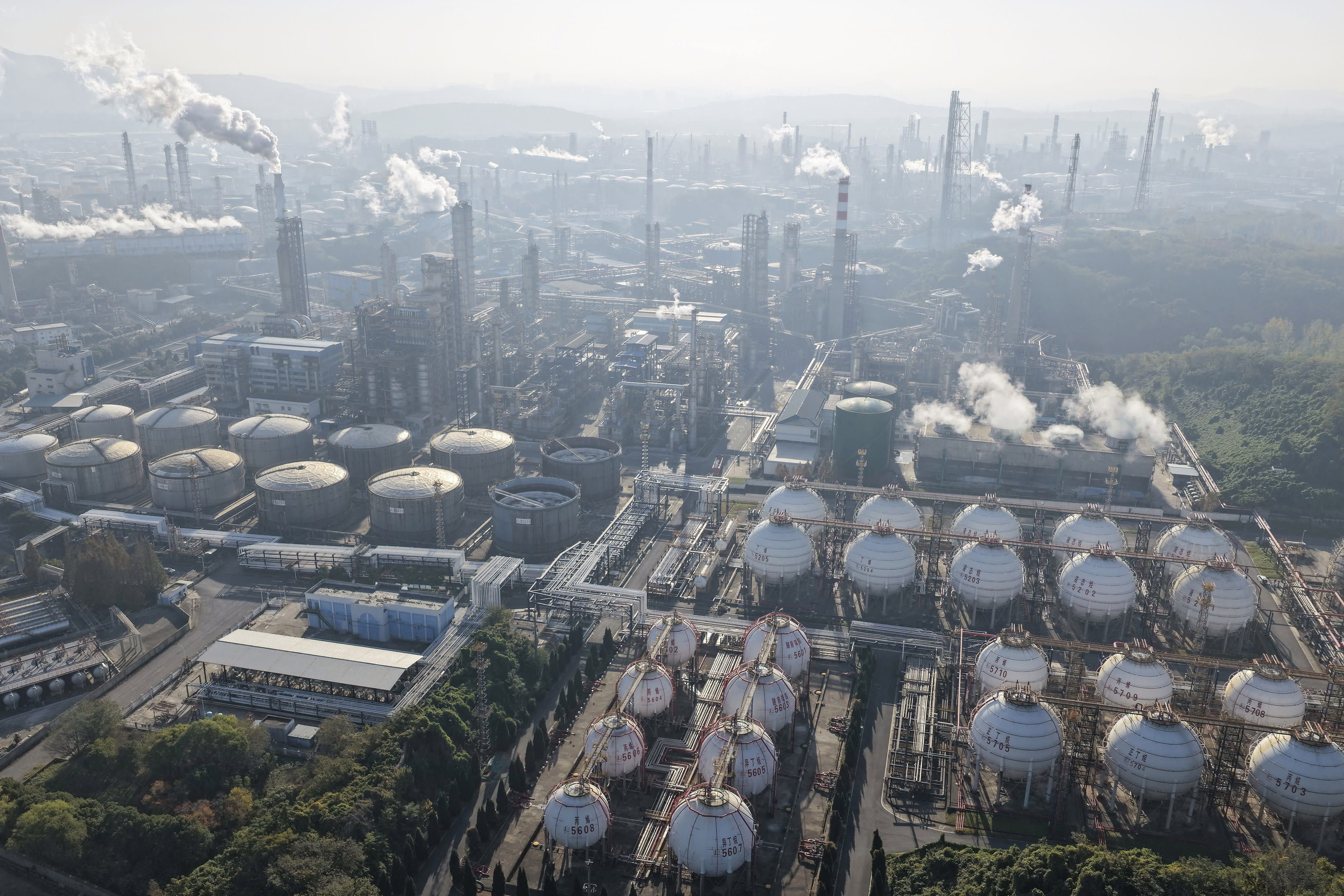 An aerial view shows a petrochemical plant in operation by the Yangtze River in Nanjing, in eastern China