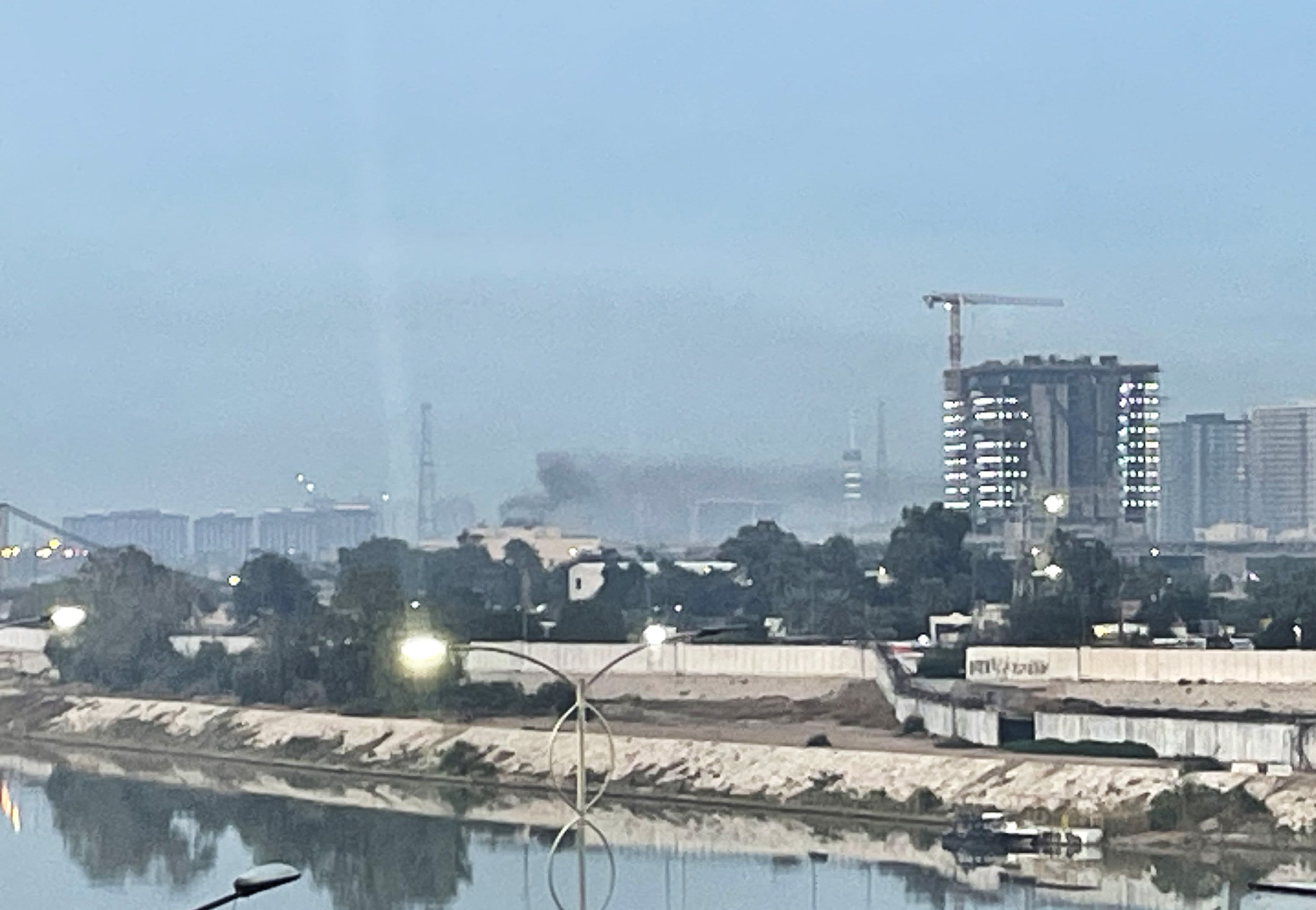 Smoke rises following a drone attack on the US embassy in Baghdad on March 14, 2026. A drone struck the US embassy in Baghdad on March 14, an Iraqi security official said, as an AFP journalist saw smoke rising from the complex. (photo credit: AFP VIA GETTY IMAGES)