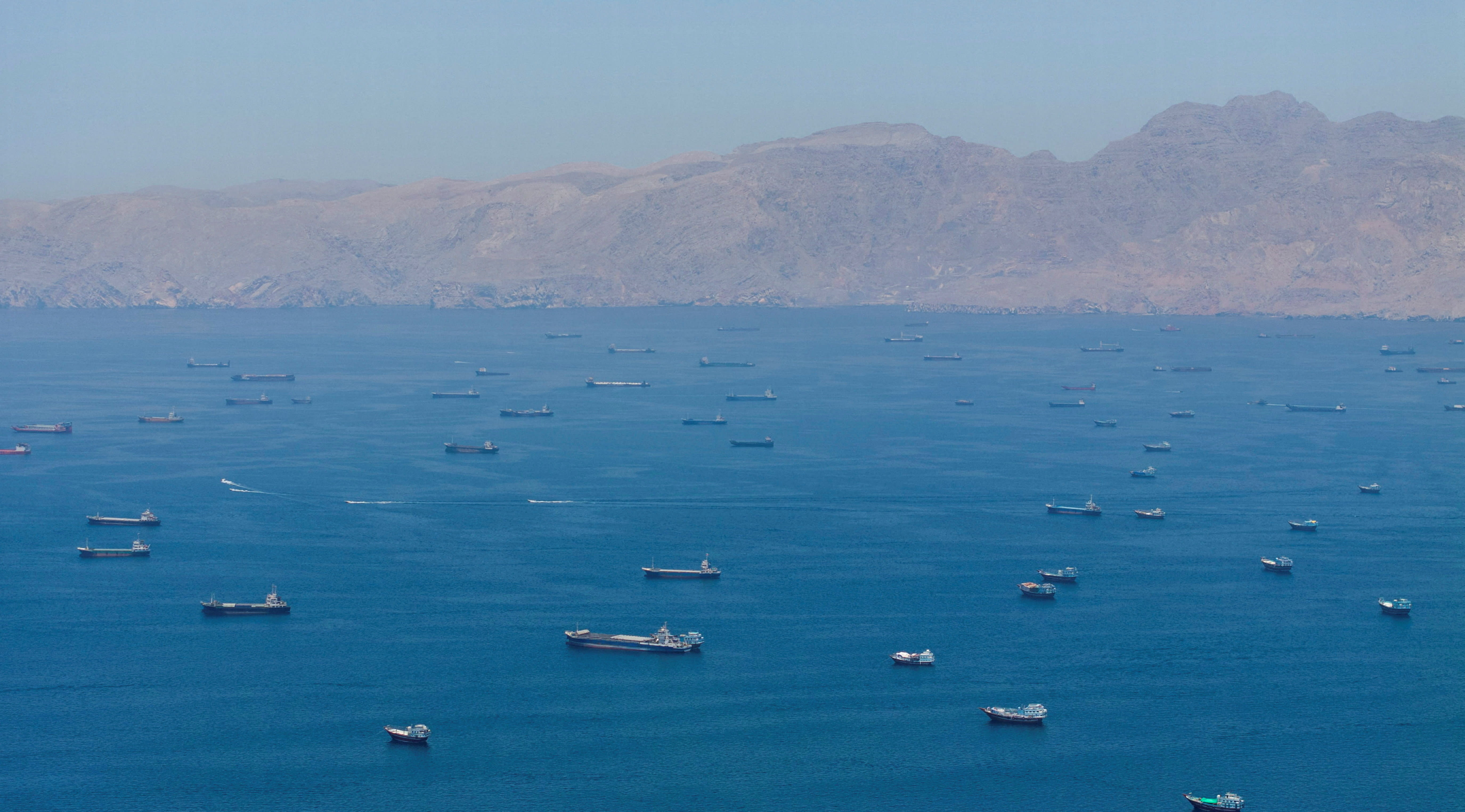 A drone view shows vessels anchored at the Strait of Hormuz, as seen from Musandam, Oman, May 25, 2026. (photo credit: Stringer/Reuters)