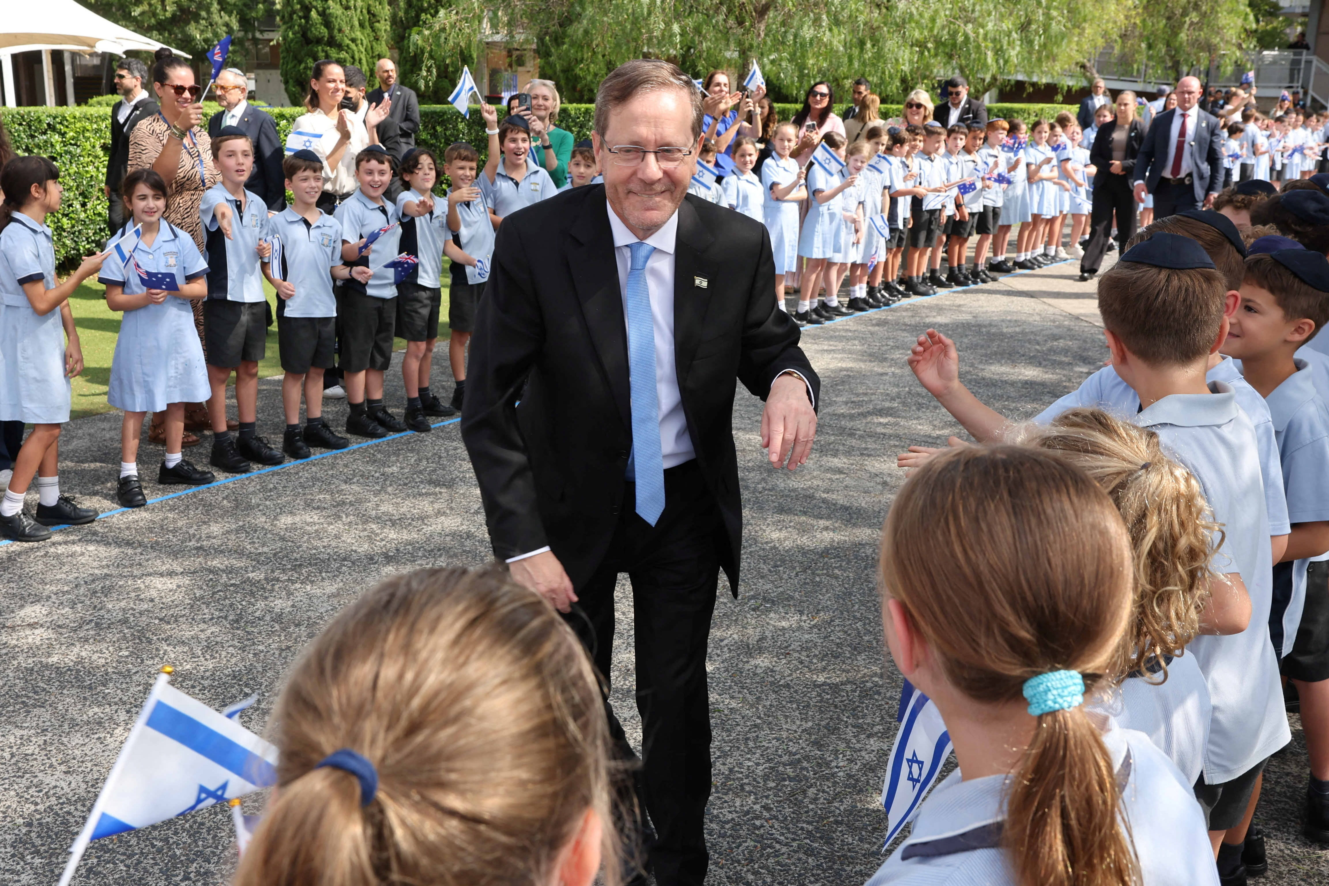 Israeli President Isaac Herzog meets students at Moriah War Memorial College during his state visit following a deadly mass shooting at a Jewish Hanukkah celebration at Bondi Beach on December 14, in Sydney, Australia, February 10, 2026.  (photo credit: Rohan Kelly/Pool via REUTERS)