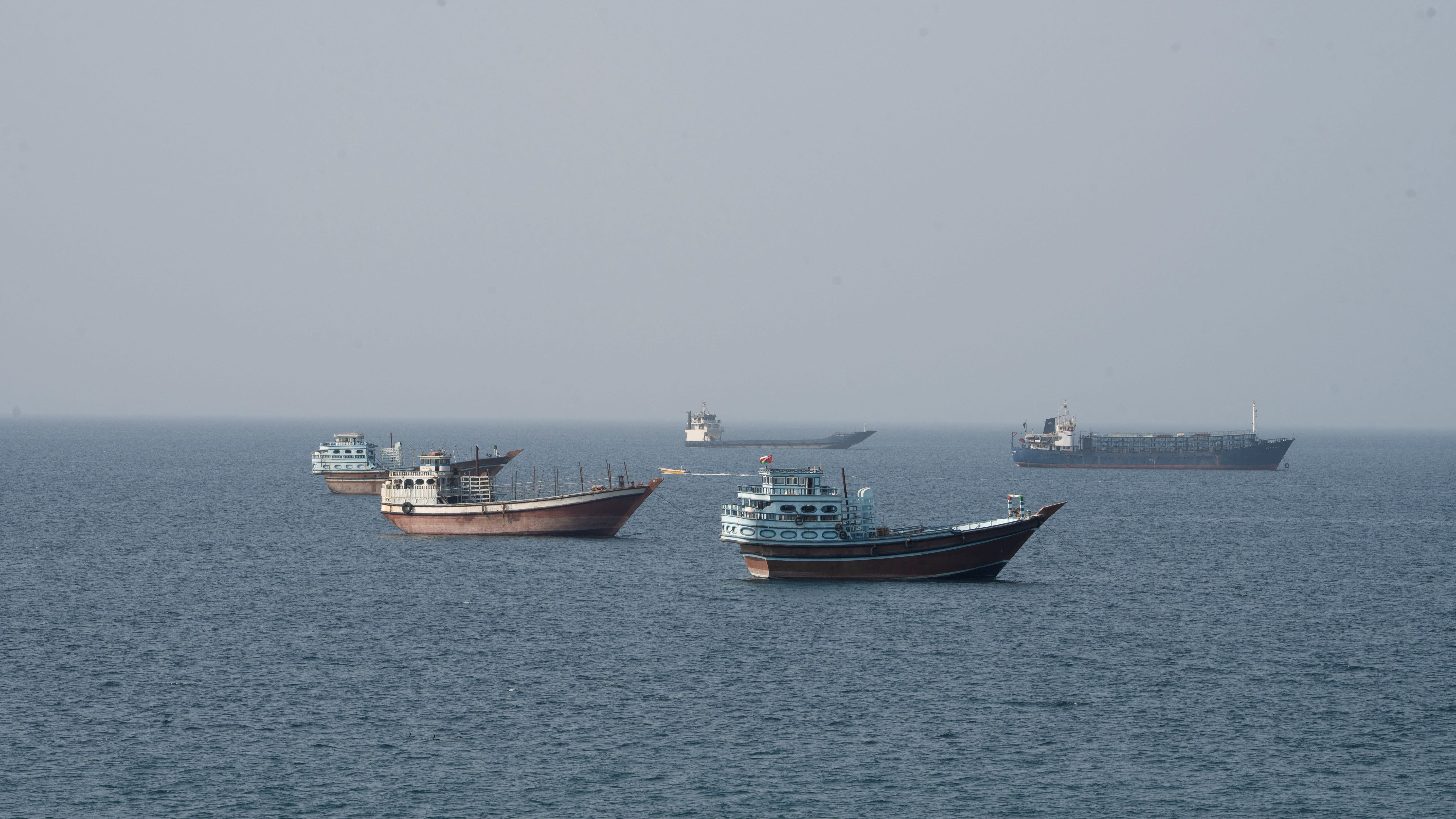 Vessels near the Strait of Hormuz, as seen from Musandam, Oman, August 17, 2026. (photo credit: REUTERS/STRINGER)