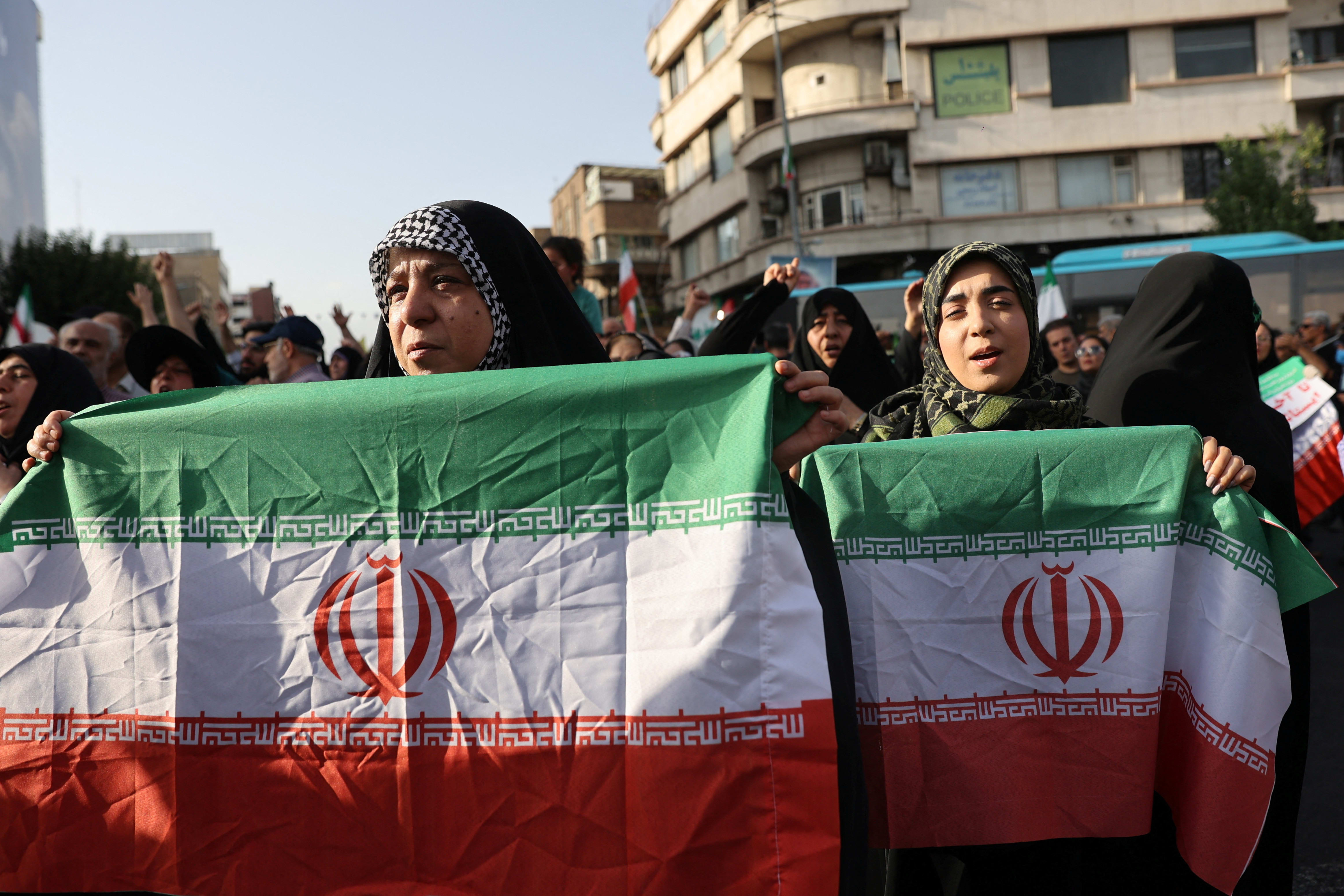  People attend a protest against the US attack on Iranian nuclear sites, in Tehran, Iran, June 22, 2025 (photo credit: MAJID ASGARIPOUR/WANA (WEST ASIA NEWS AGENCY) VIA REUTERS)