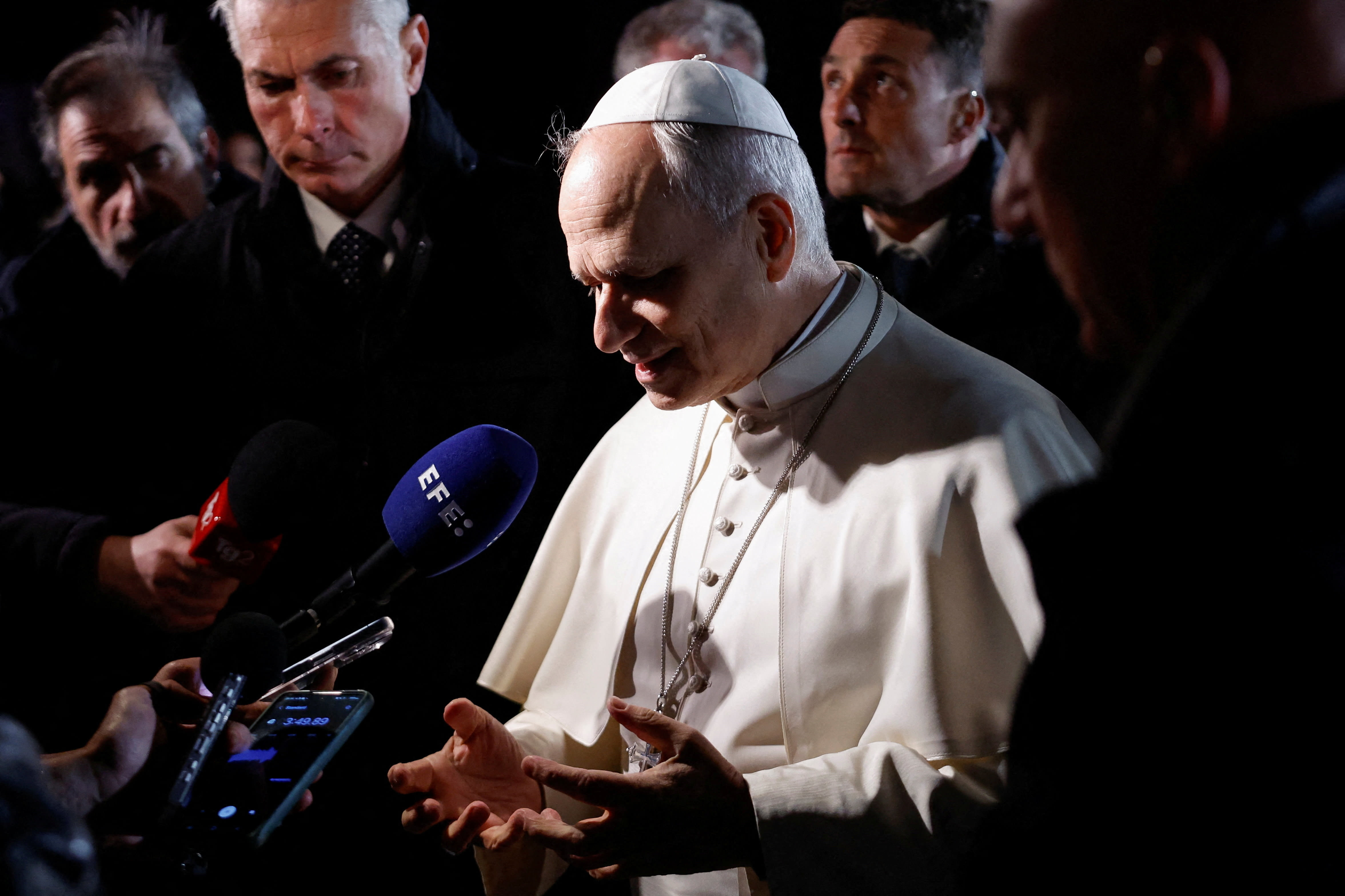 Pope Leo XIV speaks to the media as he leaves the papal residence to head back to the Vatican, in Castel Gandolfo, Italy, March 31, 2026. (photo credit: REUTERS/REMO CASILLI)