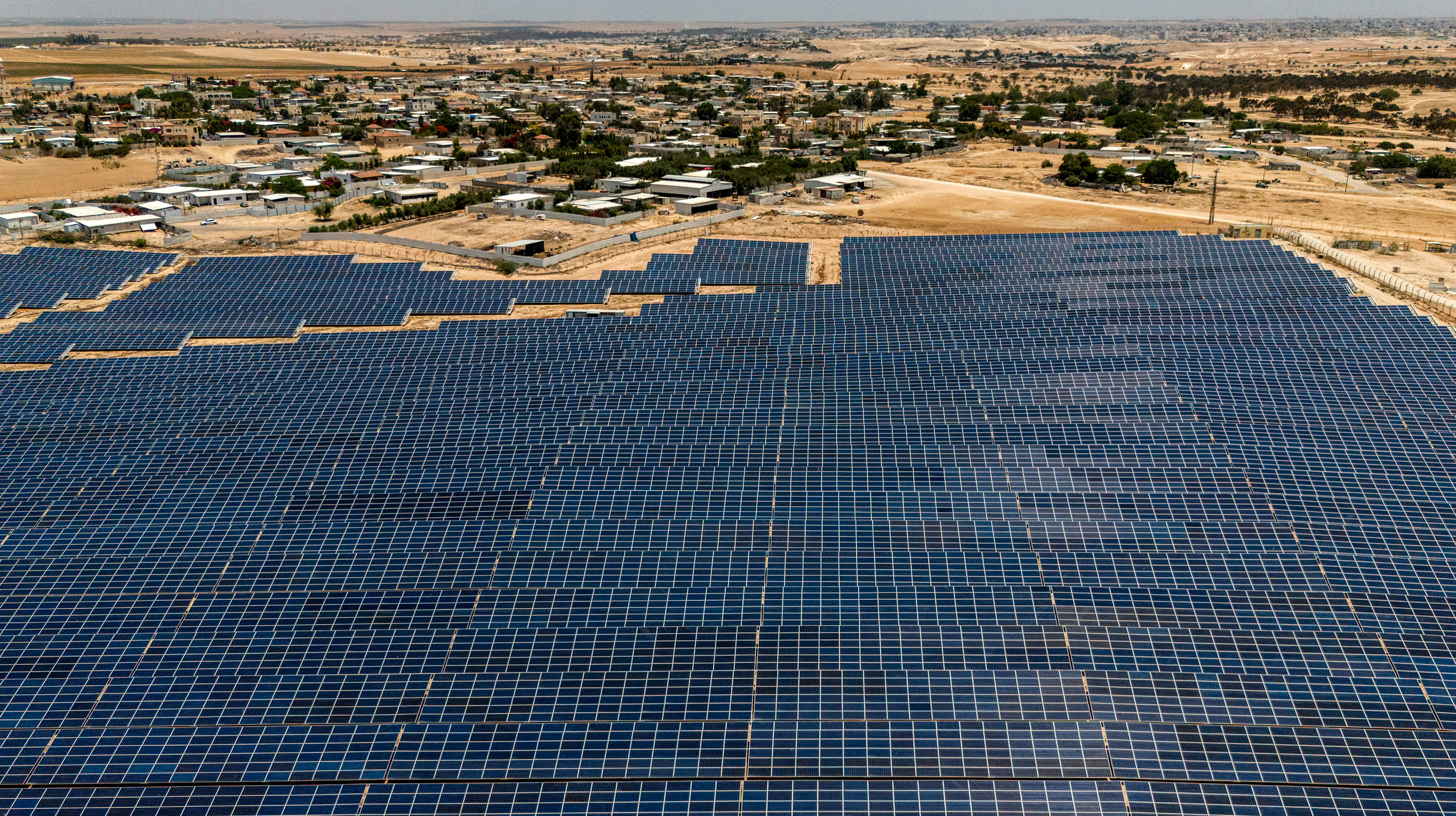 An electricity-generation plant in the Bedouin village of Tirabin al-Sana in Israel’s Negev Desert. Israel must do more to foster renewable solar, gas, and wind energy.  (photo credit: Menahem Kahana/AFP via Getty Images)