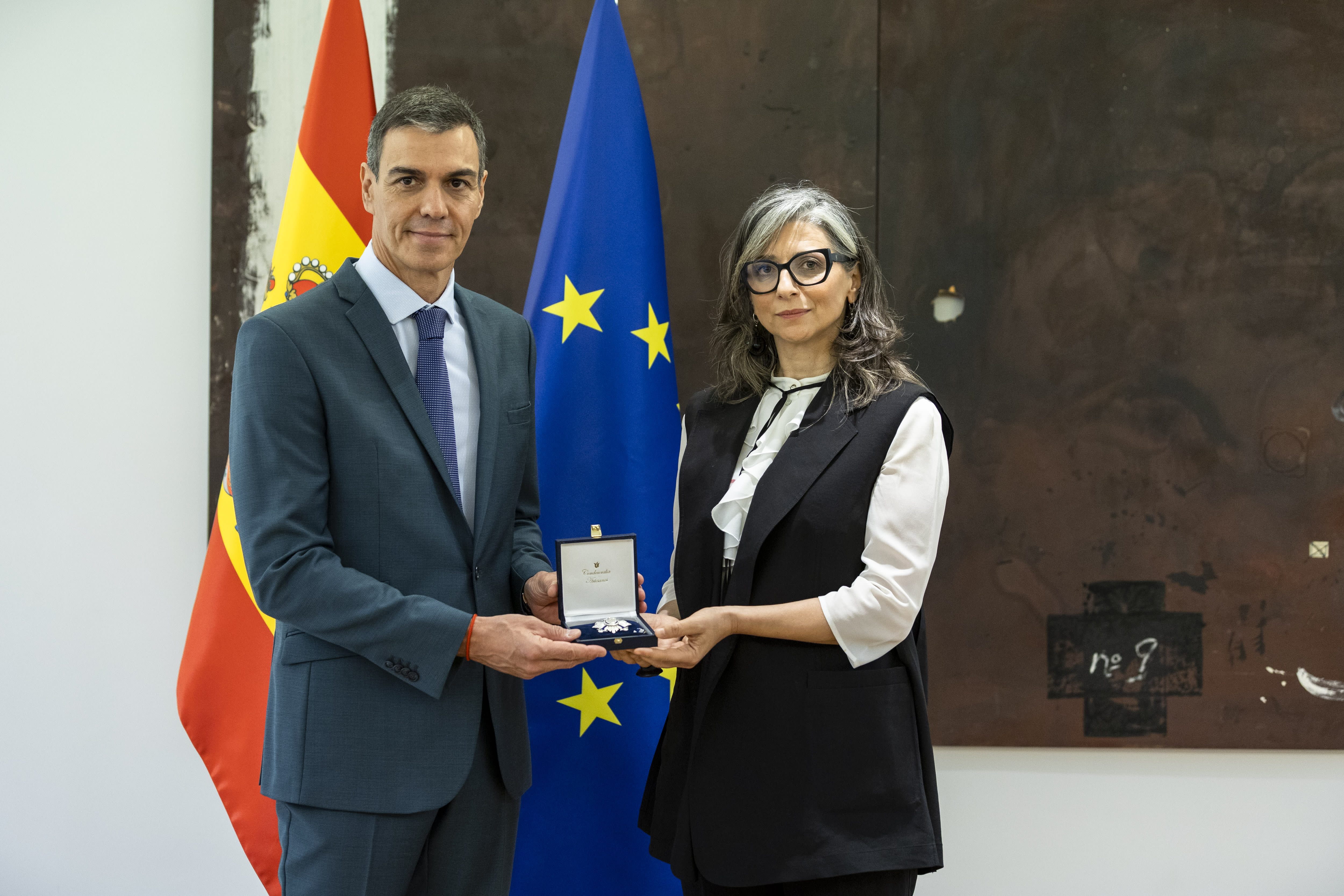 Spanish Prime Minister Pedro Sanchez presents the Commander