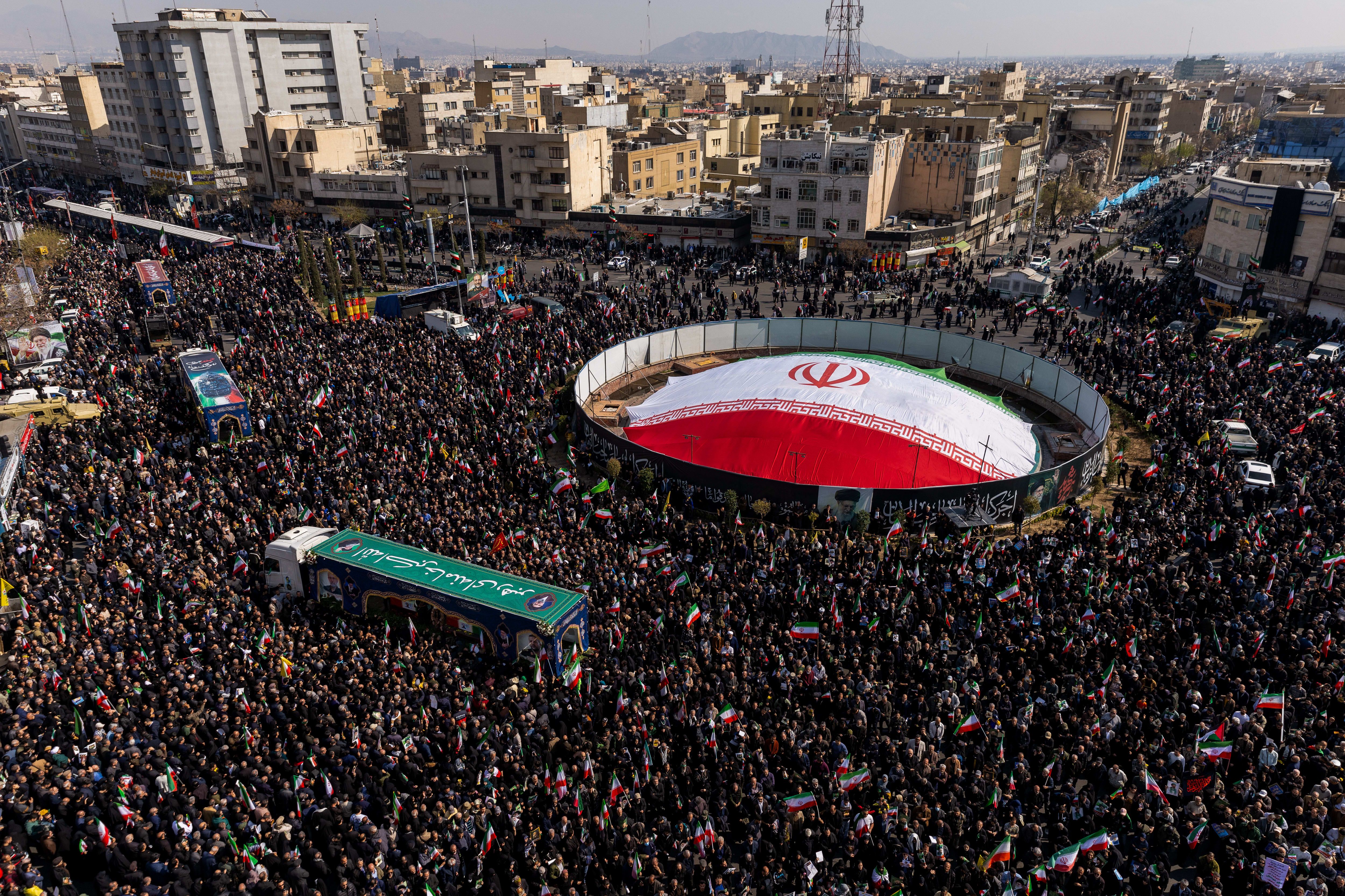 Iran releases videos of crowds celebrating renewed attacks o