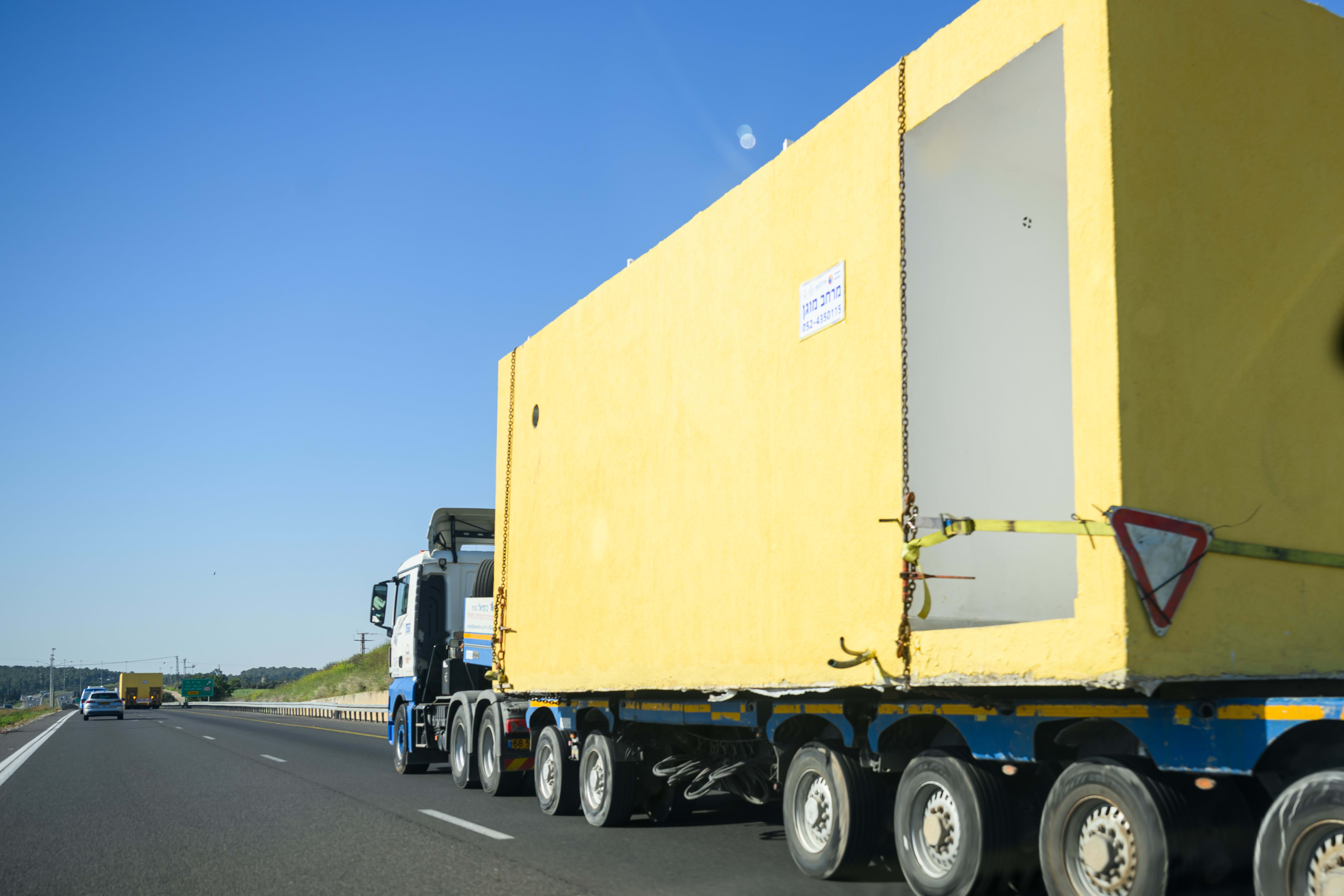 An outdoor bomb shelter is transported down the highway on March 21, 2024 in southern Israel. (photo credit: Alexi J. Rosenfeld/Getty Images)