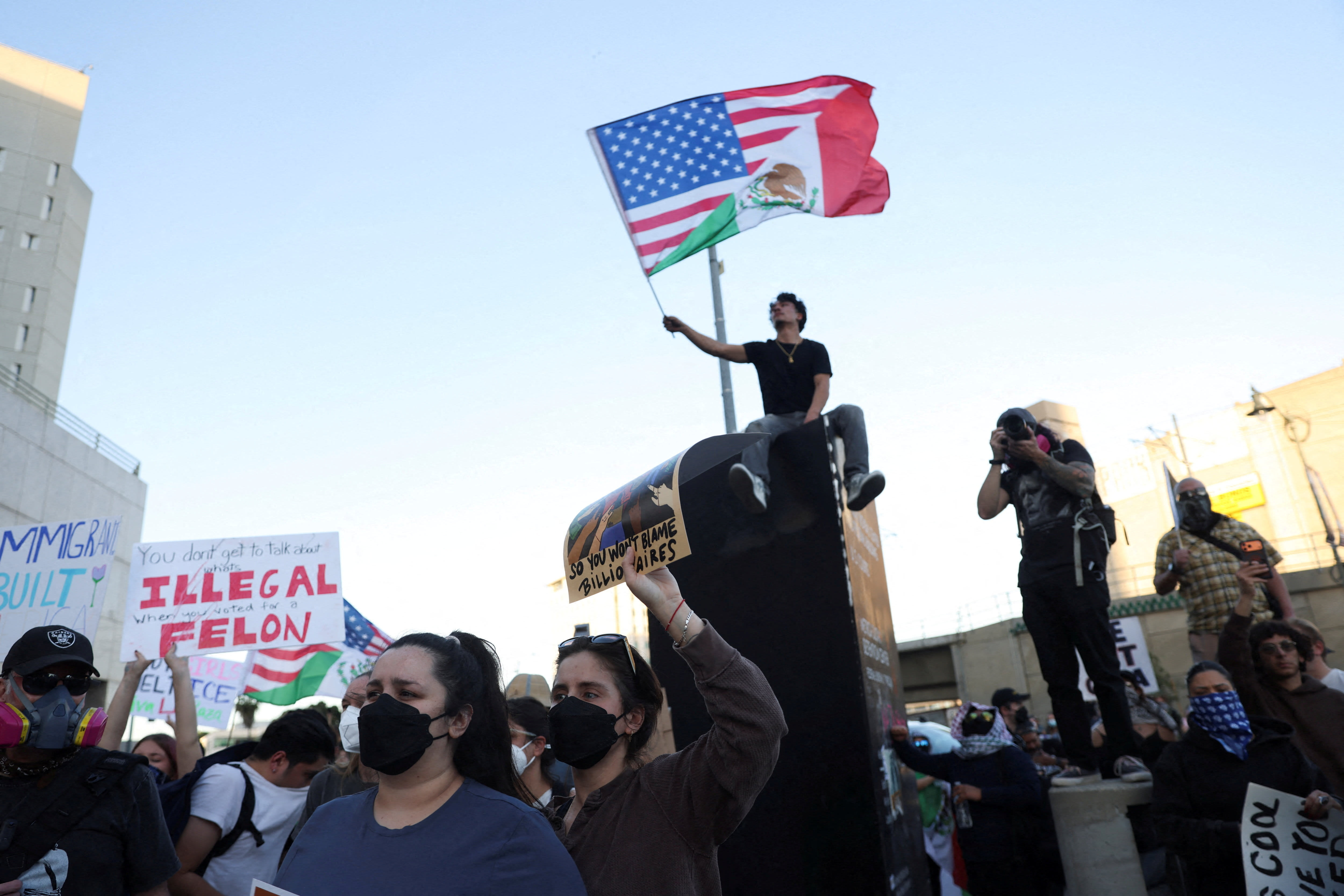 People protest against U.S. Immigration and Customs Enforcement (ICE) and U.S. President Donald Trump