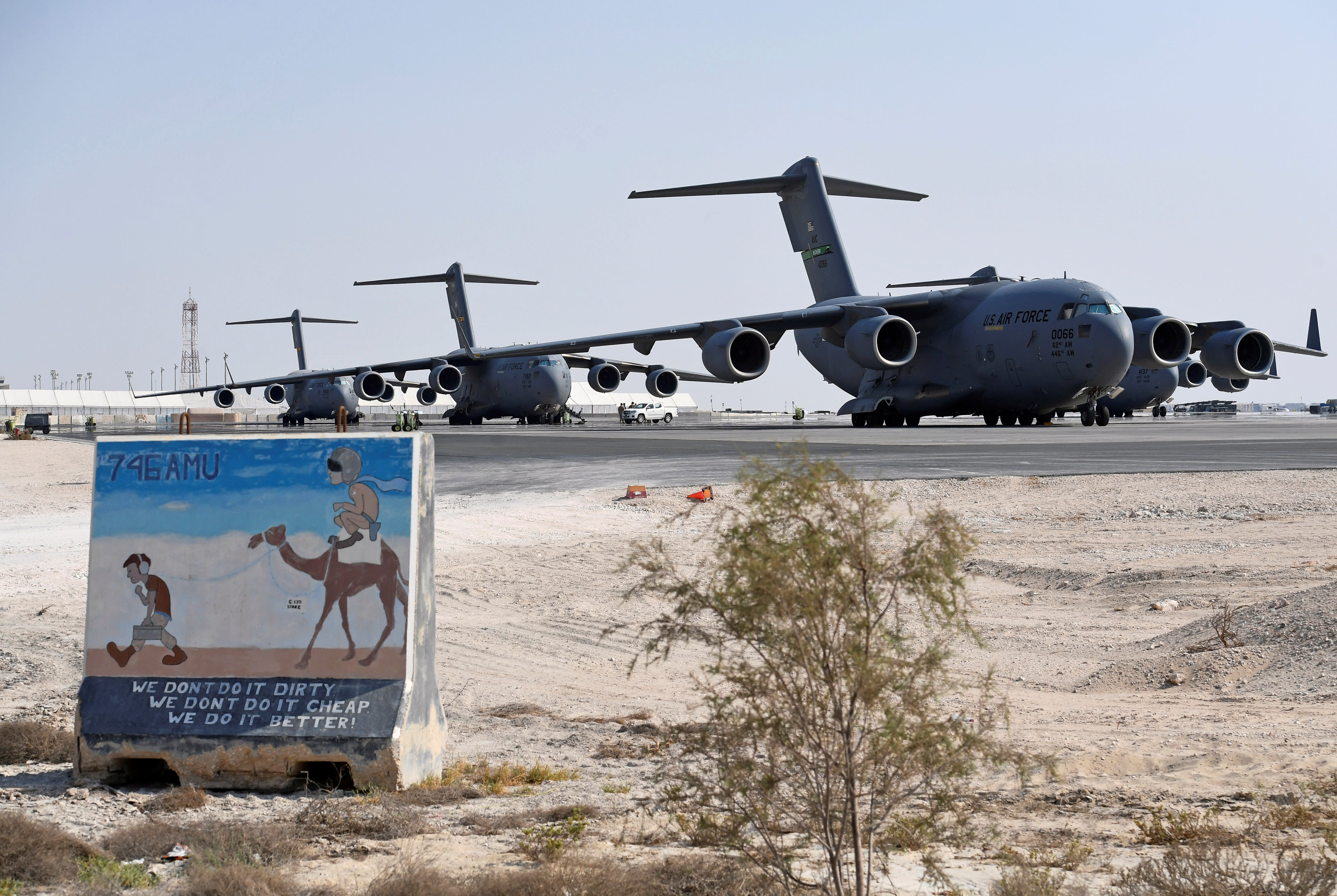  General view of US Air Force C-17 Globemaster aircrafts at al-Udeid Air Base which is housing Afghan refugees, in Doha, Qatar September 7, 2021 (photo credit: OLIVIER DOULIERY/POOL VIA REUTERS)