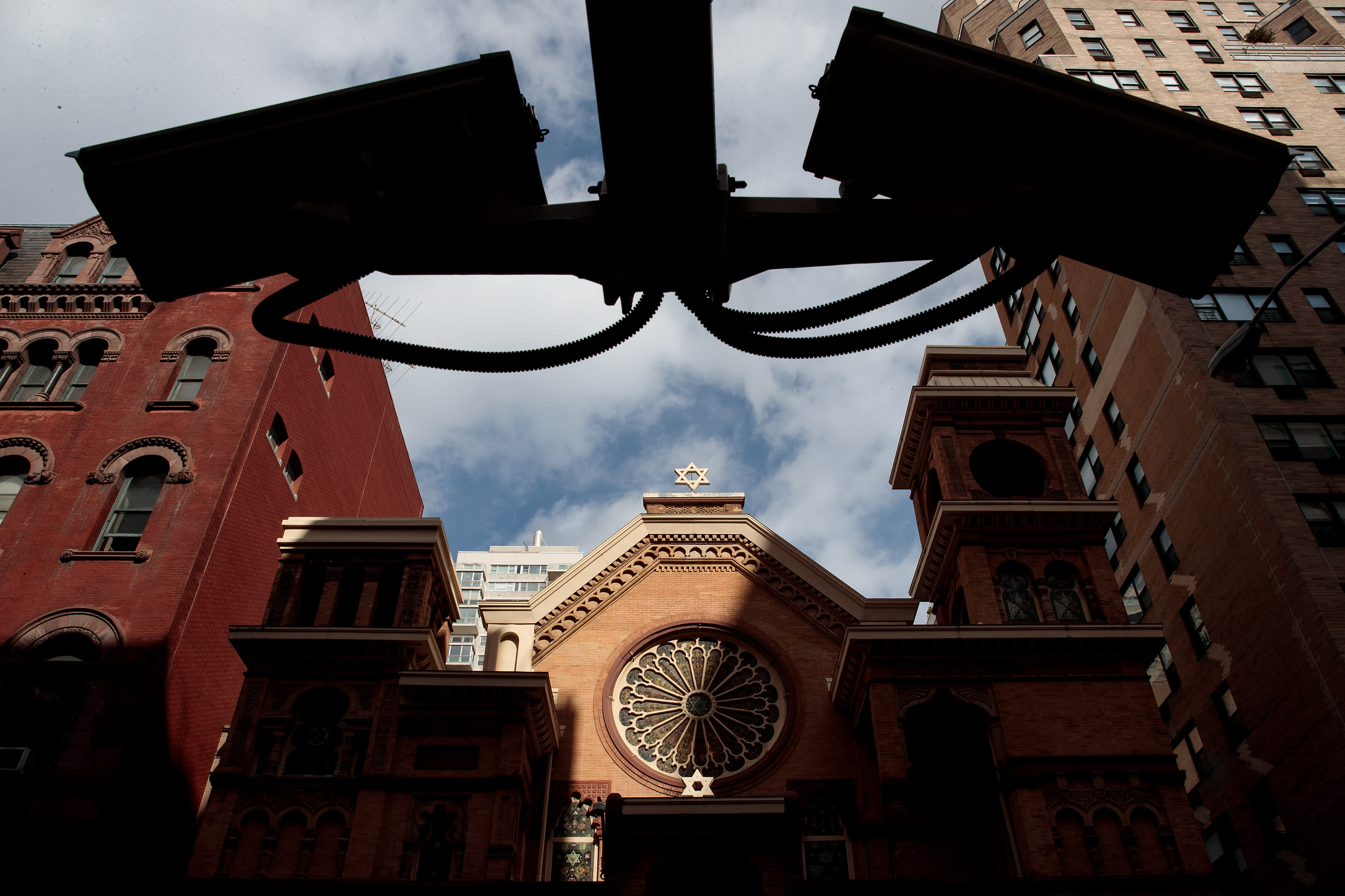 Security cameras hang across the street from the Park East Synagogue, NY, 3, 2017, Illustrative. (photo credit: DREW ANGERER/GETTY IMAGES)