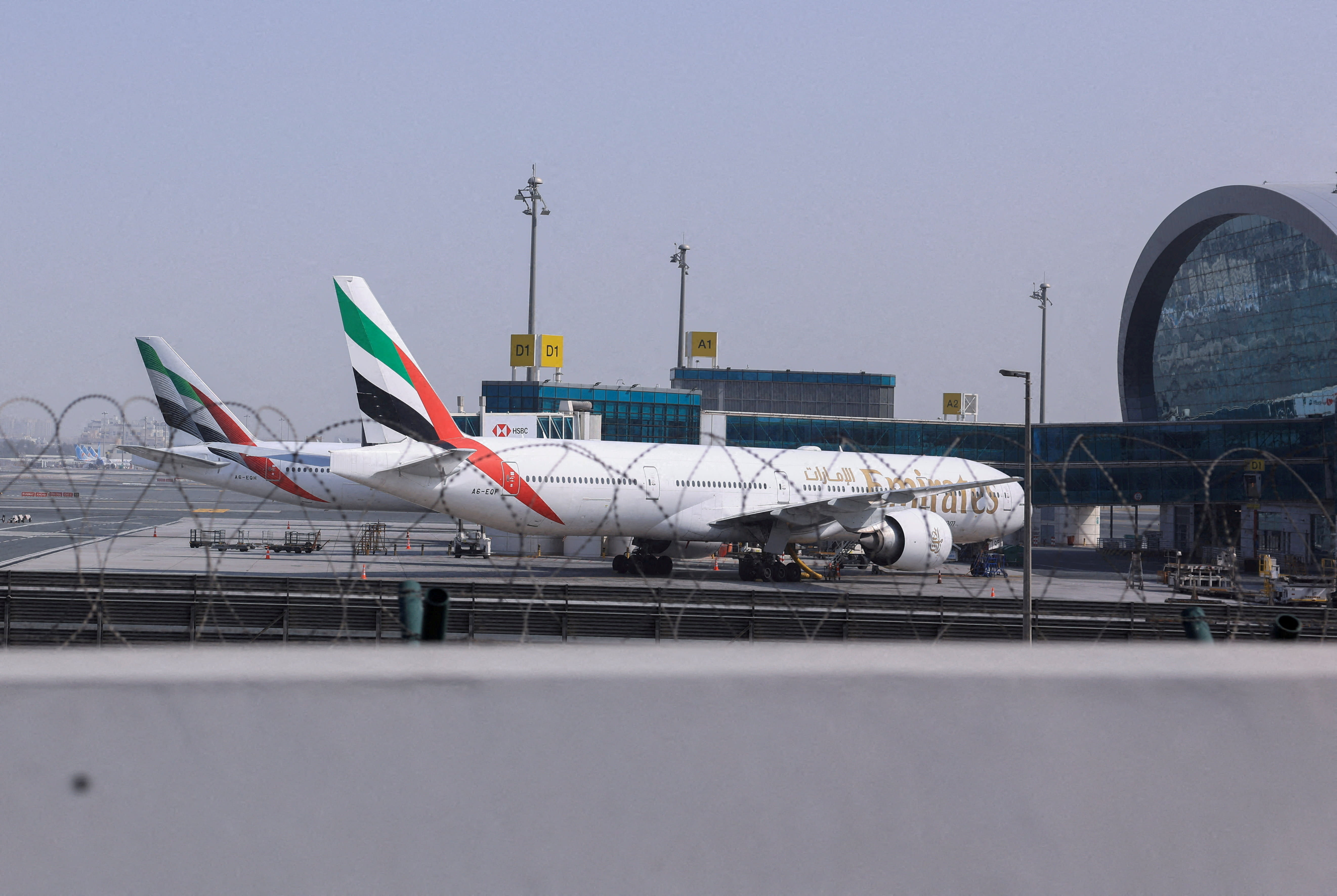 Planes are parked at Terminal 3 of the Dubai International Airport, following the United States and Israel strikes on Iran, in Dubai, United Arab Emirates, March 2, 2026. (photo credit:  REUTERS/Raghed Waked)